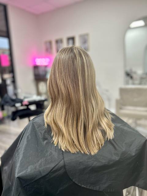 A soft blonde balayage, seen from the back