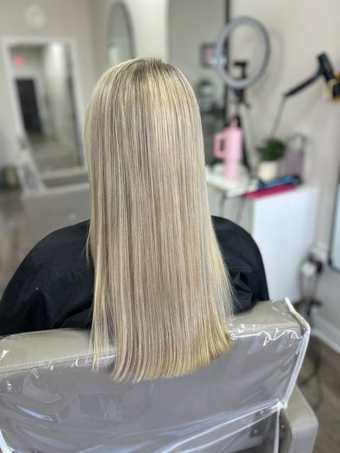Long, straight platinum blonde